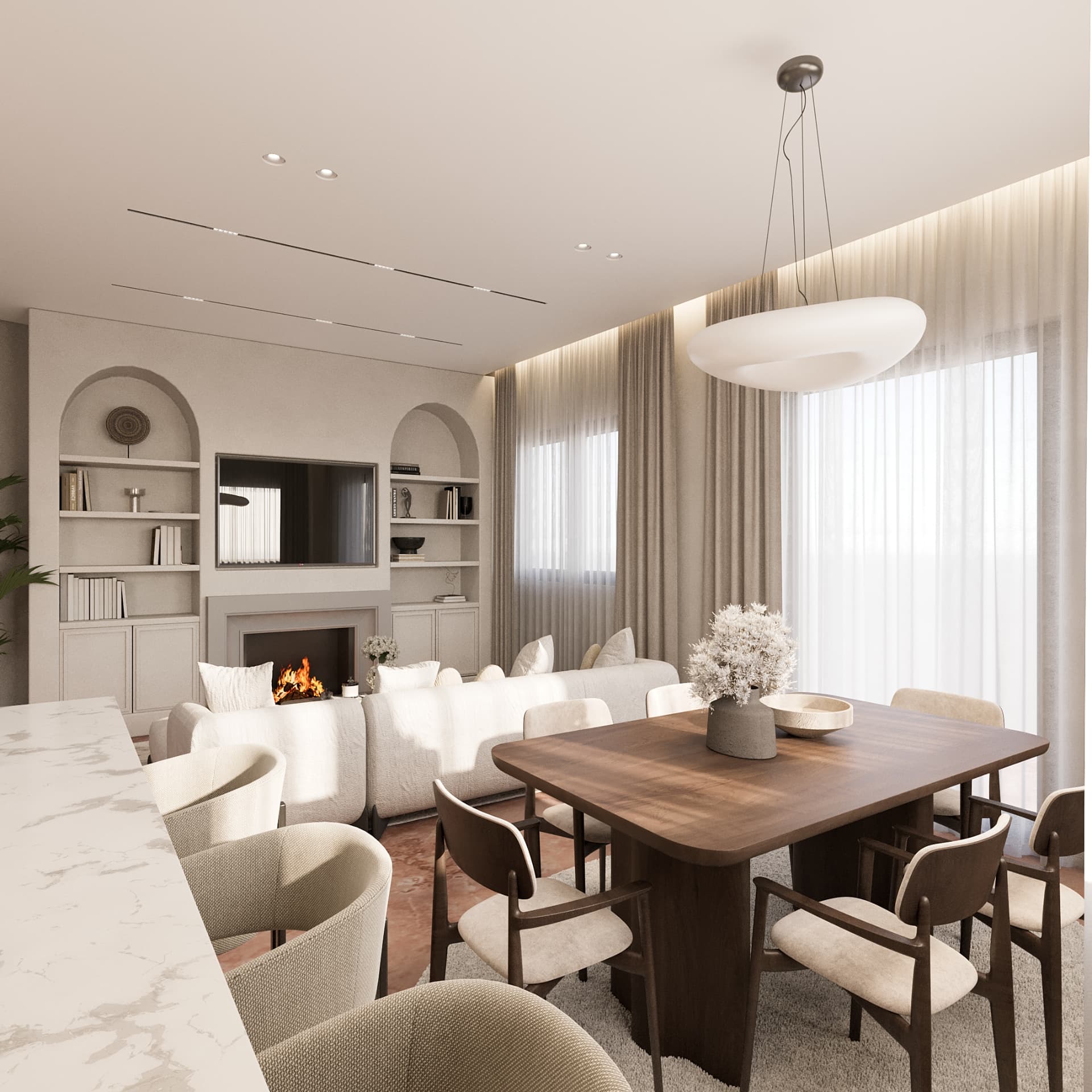 Living room of Thea with built-in shelving and lit fireplace